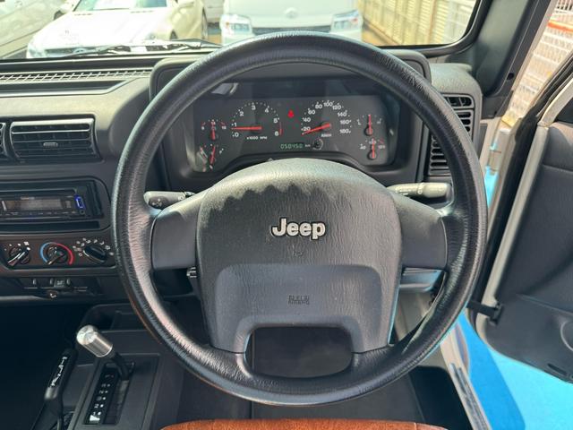 ジープ・ラングラー スポーツ　４ＷＤ　社外前後バンパー　社外マフラー　社外オーバーフェンダー　社外１６インチＡＷ　ＥＴＣ（24枚目）