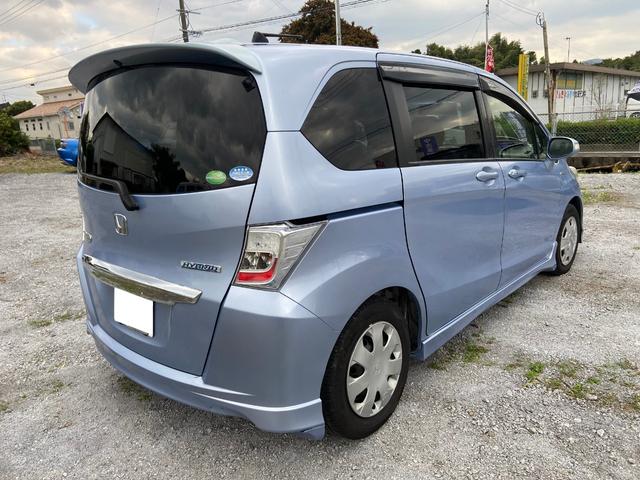 フリードハイブリッド ジャストセレクション ナビ バックカメラ 左側パーワースライドドア ETC 6人乗り 3列シート(3枚目)