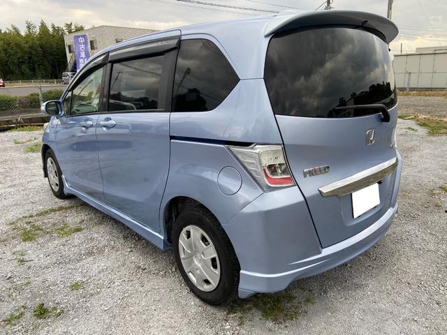 フリードハイブリッド ジャストセレクション ナビ バックカメラ 左側パーワースライドドア ETC 6人乗り 3列シート(4枚目)