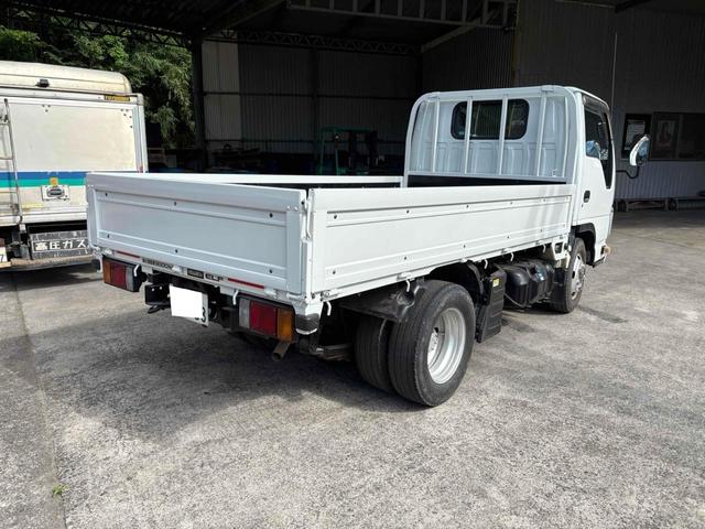 エルフトラック フラットロー 3トン4WDトラック 全塗装 荷台鉄板張り、4方ドア板交換済 三方開 MT 後輪ダブル パワステ アイドリングストップ 電動格納ミラー ABS エアコン パワーウィンドウ(5枚目)
