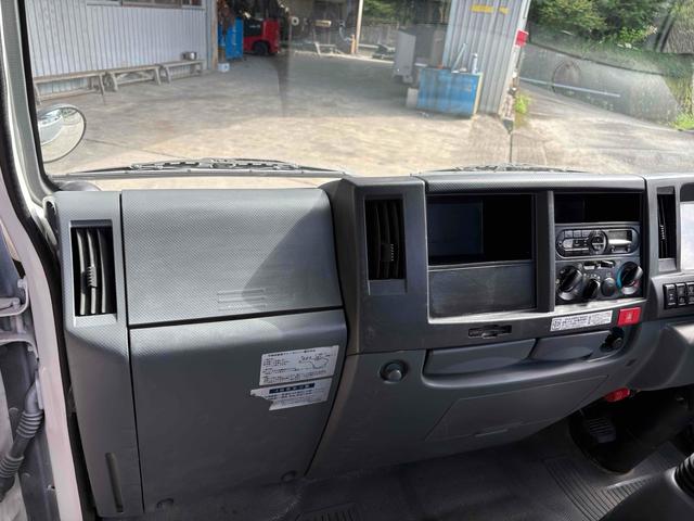 エルフトラック フラットロー 3トン4WDトラック 全塗装 荷台鉄板張り、4方ドア板交換済 三方開 MT 後輪ダブル パワステ アイドリングストップ 電動格納ミラー ABS エアコン パワーウィンドウ(19枚目)