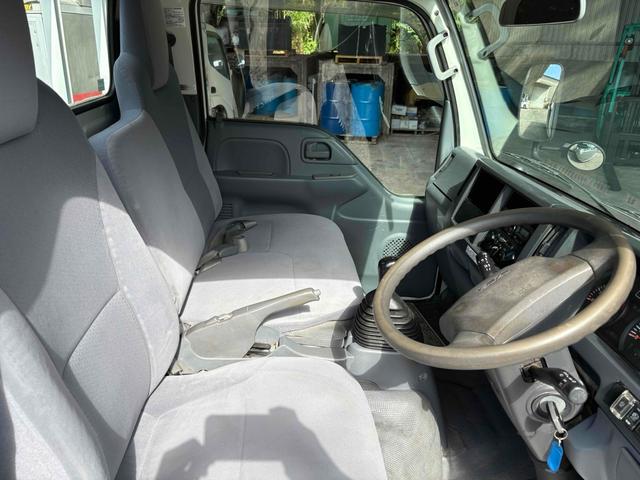 エルフトラック フラットロー 3トン4WDトラック 全塗装 荷台鉄板張り、4方ドア板交換済 三方開 MT 後輪ダブル パワステ アイドリングストップ 電動格納ミラー ABS エアコン パワーウィンドウ(23枚目)