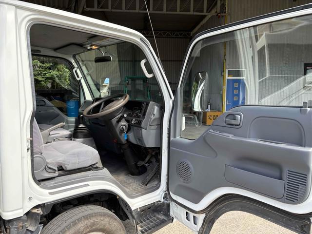 エルフトラック フラットロー 3トン4WDトラック 全塗装 荷台鉄板張り、4方ドア板交換済 三方開 MT 後輪ダブル パワステ アイドリングストップ 電動格納ミラー ABS エアコン パワーウィンドウ(24枚目)
