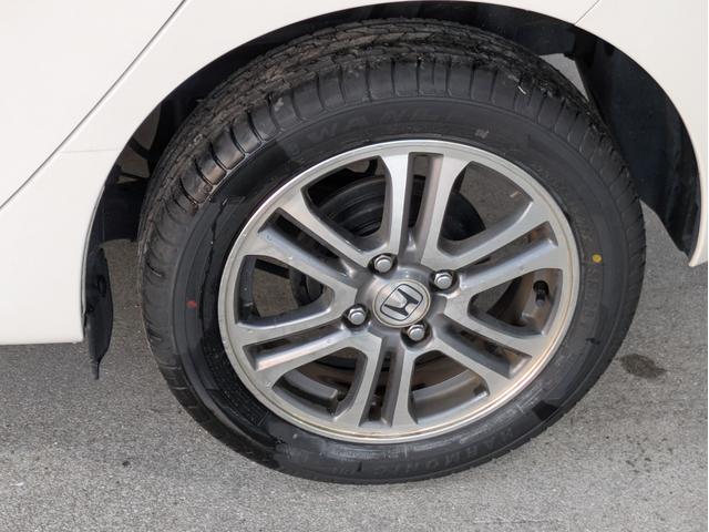 N-WGN G タイヤ4本新品 車検令和9年9月 エンジンプッシュスタート スマートキー アルミホイール 横滑り防止機能 ヘッドライトレベライザー ETC ナビTV AAC DVD再生 アイドリングストップ(13枚目)