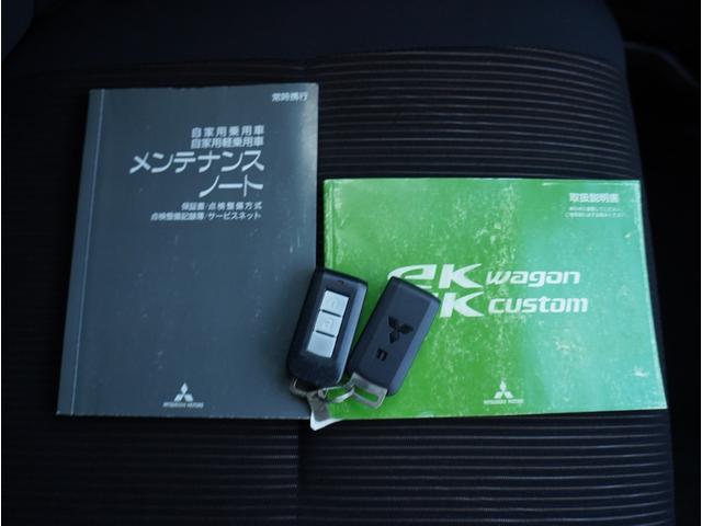 ｅＫカスタム Ｔ　オートディスチャージヘッドライト　キーレスオペレーション　プッシュスタート　ＥＴＣ　バックカメラ　ナビ　フルセグＴＶ　純正１５ｉｎアルミホイール　電動格納ミラー　オートエアコン　ベンチシート（30枚目）