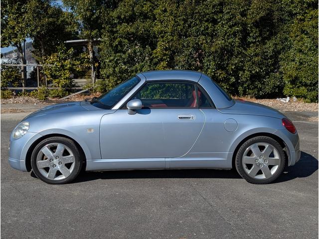 コペン アクティブトップ　純正１５ｉｎアルミホイール　マニュアルモード付ＡＴ　ＭＯＭＯステアリング　革シート　ＨＩＤヘッドライト　フォグランプ　電動格納ミラー（8枚目）