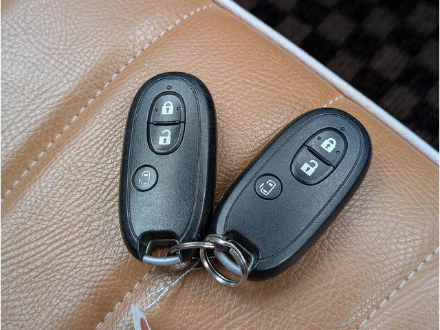 パレット Ｘ　スマートキー２個　片側パワースライドドア　ナビＴＶ　メモリーナビ　フルセグＴＶ　ＣＤ　ＤＶＤ　Ｂｌｕｅｔｏｏｔｈ　純正１４ｉｎアルミホイール　オートエアコン　電動格納ミラー　ベンチシート　シートカバー（29枚目）