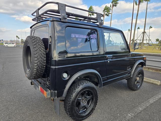 ジムニー 　修復事故歴無し　５ＭＴ　リフトＵＰ　オーバーフェンダー　Ｉ型グリル　ルーフラック　ワイドアルミ　レザー調シート　社外ステアリング　ＥＴＣ（15枚目）