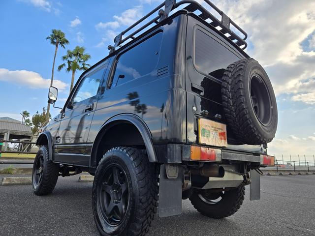 ジムニー 　修復事故歴無し　５ＭＴ　リフトＵＰ　オーバーフェンダー　Ｉ型グリル　ルーフラック　ワイドアルミ　レザー調シート　社外ステアリング　ＥＴＣ（16枚目）