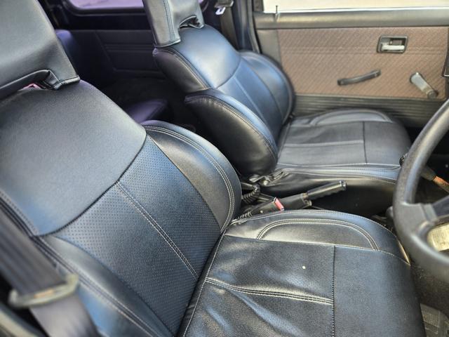 ジムニー 　修復事故歴無し　５ＭＴ　リフトＵＰ　オーバーフェンダー　Ｉ型グリル　ルーフラック　ワイドアルミ　レザー調シート　社外ステアリング　ＥＴＣ（25枚目）