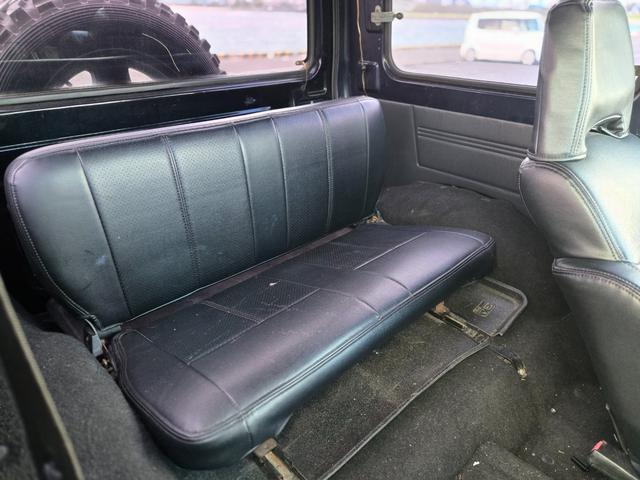 ジムニー 　修復事故歴無し　５ＭＴ　リフトＵＰ　オーバーフェンダー　Ｉ型グリル　ルーフラック　ワイドアルミ　レザー調シート　社外ステアリング　ＥＴＣ（26枚目）