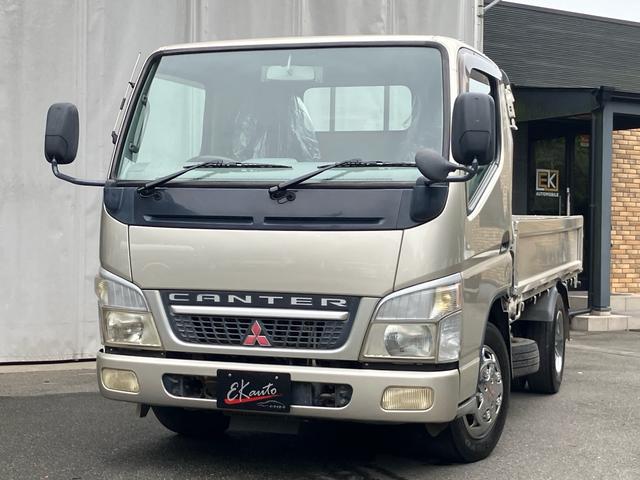 キャンター 2t 低床 荷台床鉄板張り 3方開 電動格納ミラー 5速マニュアル 4900ディーゼルターボ 純正色全塗装済み リヤWタイヤ ABS エアバッグ(2枚目)