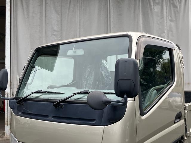 キャンター 2t 低床 荷台床鉄板張り 3方開 電動格納ミラー 5速マニュアル 4900ディーゼルターボ 純正色全塗装済み リヤWタイヤ ABS エアバッグ(4枚目)
