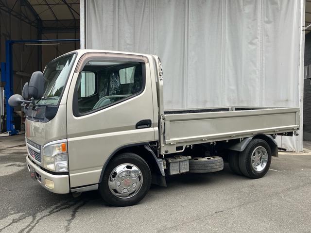 キャンター 2t 低床 荷台床鉄板張り 3方開 電動格納ミラー 5速マニュアル 4900ディーゼルターボ 純正色全塗装済み リヤWタイヤ ABS エアバッグ(5枚目)