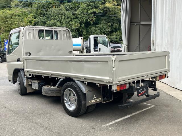 キャンター 2t 低床 荷台床鉄板張り 3方開 電動格納ミラー 5速マニュアル 4900ディーゼルターボ 純正色全塗装済み リヤWタイヤ ABS エアバッグ(10枚目)