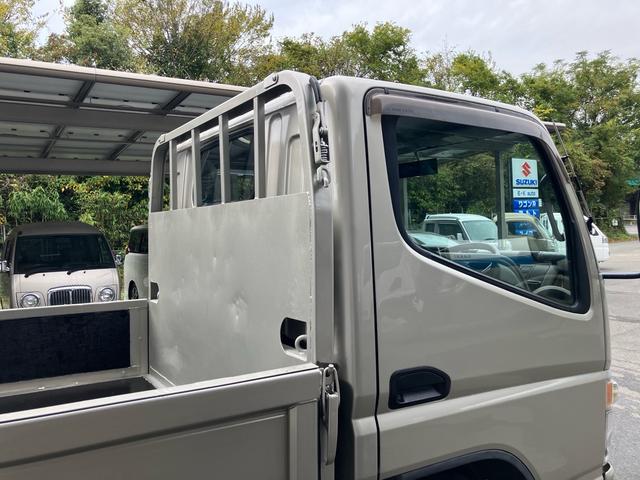 キャンター 2t 低床 荷台床鉄板張り 3方開 電動格納ミラー 5速マニュアル 4900ディーゼルターボ 純正色全塗装済み リヤWタイヤ ABS エアバッグ(30枚目)