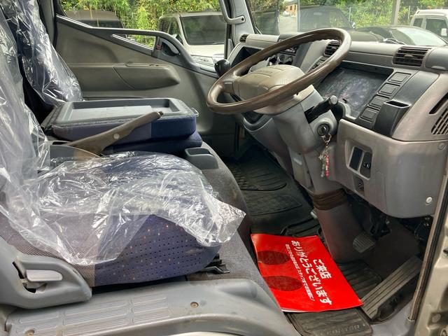 キャンター 2t 低床 荷台床鉄板張り 3方開 電動格納ミラー 5速マニュアル 4900ディーゼルターボ 純正色全塗装済み リヤWタイヤ ABS エアバッグ(33枚目)