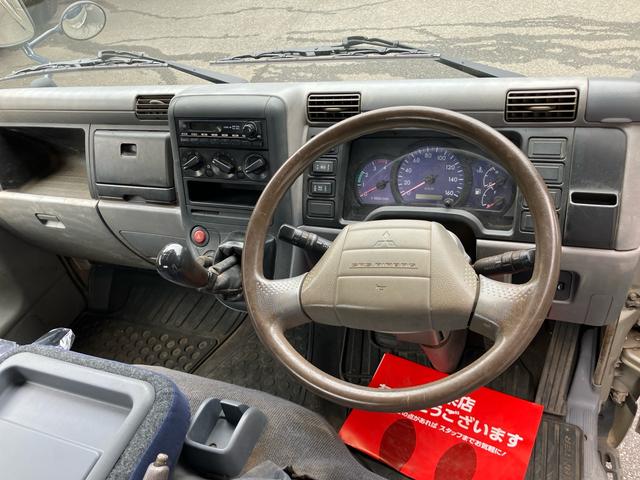 キャンター 2t 低床 荷台床鉄板張り 3方開 電動格納ミラー 5速マニュアル 4900ディーゼルターボ 純正色全塗装済み リヤWタイヤ ABS エアバッグ(39枚目)