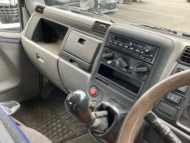 キャンター 2t 低床 荷台床鉄板張り 3方開 電動格納ミラー 5速マニュアル 4900ディーゼルターボ 純正色全塗装済み リヤWタイヤ ABS エアバッグ(43枚目)