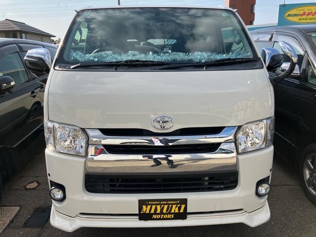 ハイエースバン ロングスーパーGL 4WD スマートキー ミュージックプレイヤー接続 USB接続 オートライト 電動格納ドアミラー 運転席・助手席エアバッグ ABS エアコン パワーステアリング(2枚目)