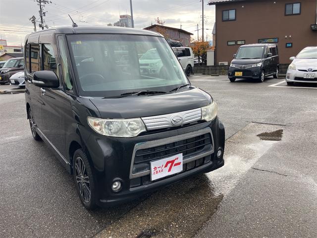 タント カスタムＸ　４ＷＤ　スマートキー　電動スライドドア　フルセグナビ　ＨＩＤヘッドライト　アルミホイール　ＨＩＤヘッドライト　電動格納ドアミラー　ベンチシート　アイドリングストップ　運転席・助手席エアバッグ　ＡＢＳ（3枚目）