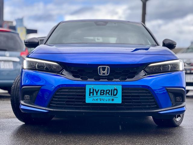 シビック e:HEV リアスポイラー BOSEサウンド ハーフレザーシート パワーシート シートヒーター LEDライト フォグ 置くだけ充電 ETC2.0 前後ドラレコ フルセグTV Bluetooth(5枚目)