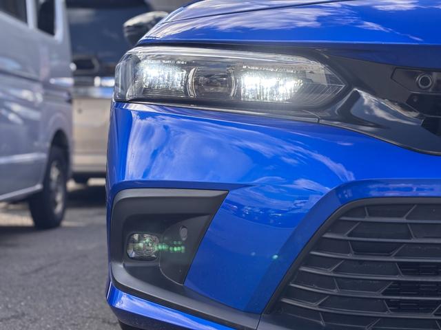 シビック e:HEV リアスポイラー BOSEサウンド ハーフレザーシート パワーシート シートヒーター LEDライト フォグ 置くだけ充電 ETC2.0 前後ドラレコ フルセグTV Bluetooth(7枚目)