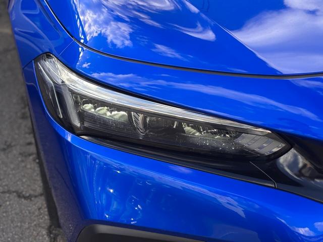 シビック e:HEV リアスポイラー BOSEサウンド ハーフレザーシート パワーシート シートヒーター LEDライト フォグ 置くだけ充電 ETC2.0 前後ドラレコ フルセグTV Bluetooth(8枚目)