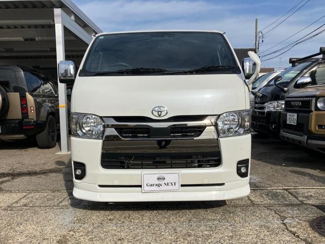 ハイエースバン スーパーGL ダークプライムII ロングボディ ディーゼルターボ 4WD スポイラー ベッドキット ETC 盗難防止システム 衝突安全ボディ 衝突被害軽減システム オートマチックハイビーム メモリーナビ フルセグTV バッグカメラ(2枚目)