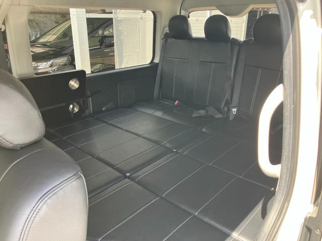 ハイエースワゴン GL ロング ミドルルーフ 4WD バットフェイス ローダウン ベットキット 盗難防止システム ETC フルセグTV 後席モニター バックカメラ メモリーナビ レーンアシスト スマートキー プッシュスタート(24枚目)