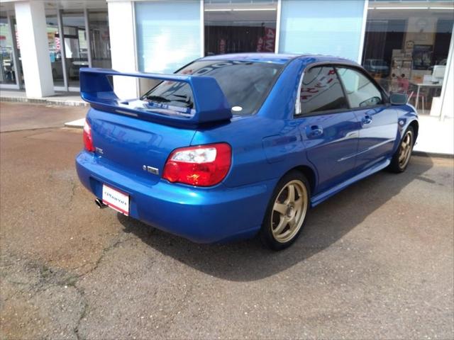 ＷＲＸ　ＷＲ－リミテッド　２００４☆外装状態良好☆　☆修復歴無し☆５速ＭＴ☆走行５．１万Ｋｍ☆ターボタイマー☆三連メーター☆セミバケシート☆キセノンヘッドライト☆サヴウーファー☆タワーバーー☆大型リアスポイラー☆(6枚目)