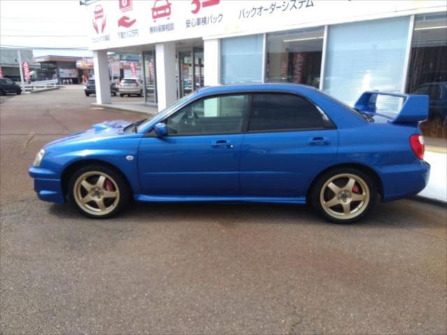 ＷＲＸ　ＷＲ－リミテッド　２００４☆外装状態良好☆　☆修復歴無し☆５速ＭＴ☆走行５．１万Ｋｍ☆ターボタイマー☆三連メーター☆セミバケシート☆キセノンヘッドライト☆サヴウーファー☆タワーバーー☆大型リアスポイラー☆(9枚目)