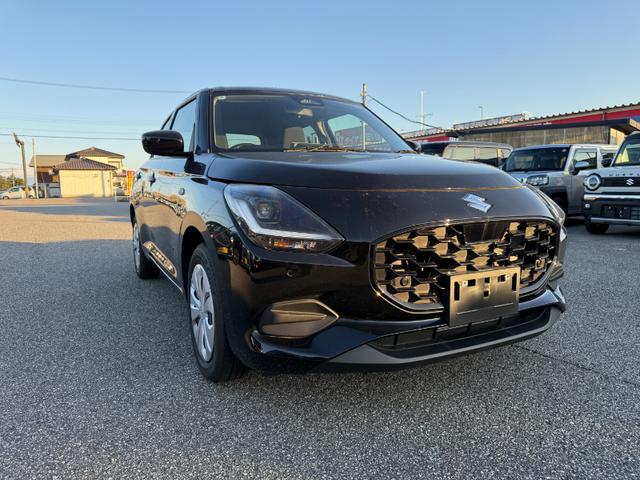 スイフト XG 登録済未使用車 スマートキー オートエアコン 盗難防止 サイドエアバッグ 電動格納式ドアミラー 横滑り防止 パワーステアリング パワーウインドウ エアコン エアバッグ ABS オートライト キーフリー(14枚目)