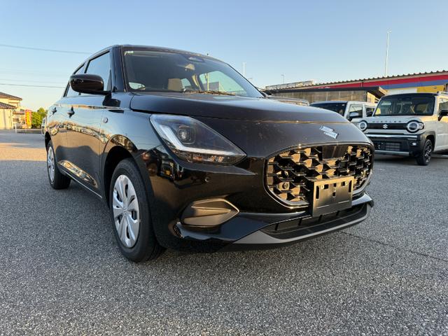 スイフト XG 登録済未使用車 スマートキー オートエアコン 盗難防止 サイドエアバッグ 電動格納式ドアミラー 横滑り防止 パワーステアリング パワーウインドウ エアコン エアバッグ ABS オートライト キーフリー(15枚目)