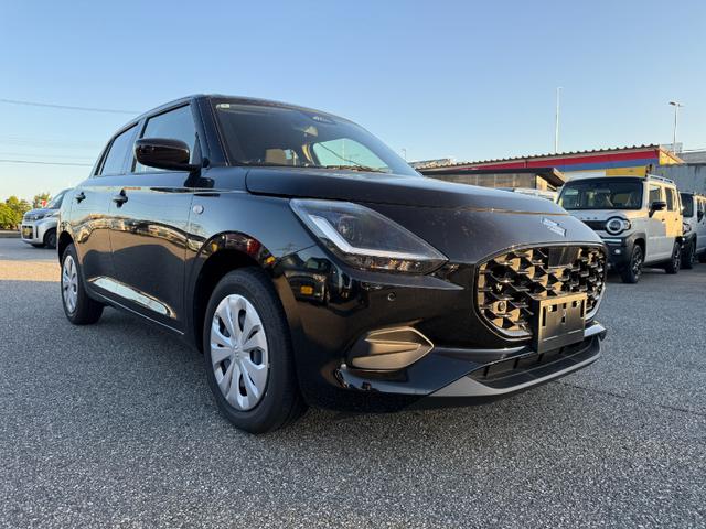 スイフト XG 登録済未使用車 スマートキー オートエアコン 盗難防止 サイドエアバッグ 電動格納式ドアミラー 横滑り防止 パワーステアリング パワーウインドウ エアコン エアバッグ ABS オートライト キーフリー(16枚目)