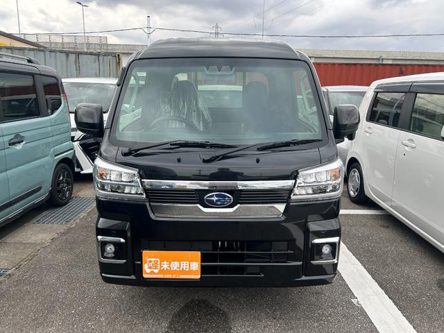 サンバートラック グランドキャブスマートアシスト 届出済未使用車 AC PS キーレス スマート 集中D 4WD コーナー 寒冷 WエアB ABS ESC イモビ Pガラス RH(2枚目)