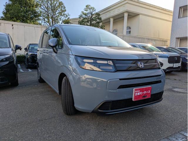 フリード e:HEVエアー 衝突被害軽減システム 盗難防止システム CVT オートライト アイドリングストップ バックカメラ オートエアコン LEDヘッドライト スマートキー 両側電動スライドドア クルーズコントロール(7枚目)