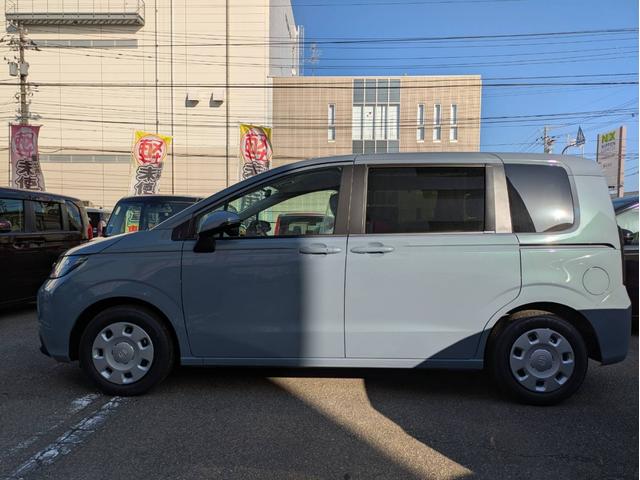 フリード e:HEVエアー 衝突被害軽減システム 盗難防止システム CVT オートライト アイドリングストップ バックカメラ オートエアコン LEDヘッドライト スマートキー 両側電動スライドドア クルーズコントロール(9枚目)