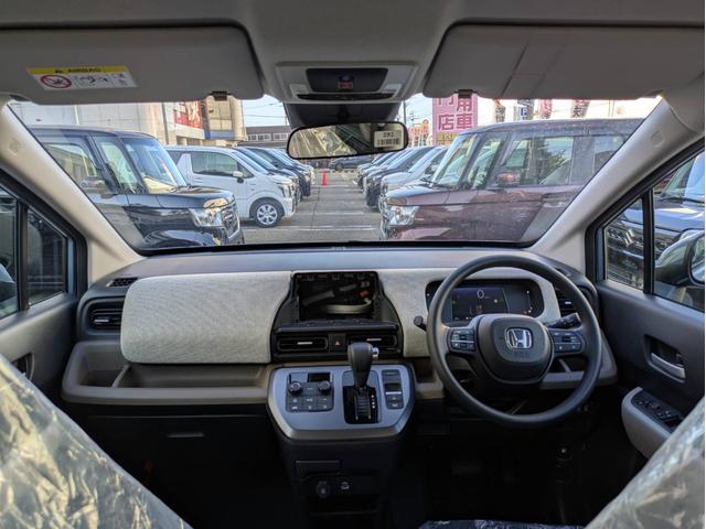 フリード e:HEVエアー 衝突被害軽減システム 盗難防止システム CVT オートライト アイドリングストップ バックカメラ オートエアコン LEDヘッドライト スマートキー 両側電動スライドドア クルーズコントロール(27枚目)