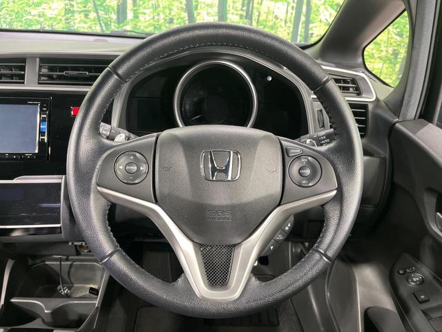 フィットハイブリッド Sパッケージ 4WD 純正ナビ バックカメラ シティブレーキサポート ETC Bluetooth フルセグ オートライト プッシュスタート 純正15インチAW クルーズコントロール 電子格納ミラー 横滑り防止装置(12枚目)