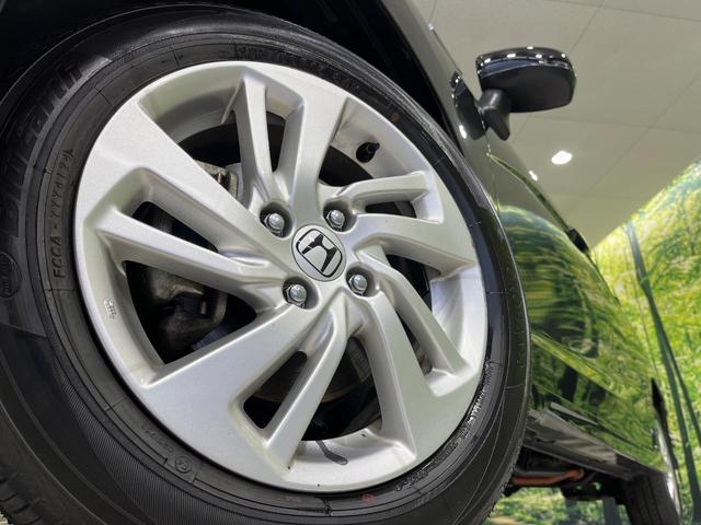 フィットハイブリッド Sパッケージ 4WD 純正ナビ バックカメラ シティブレーキサポート ETC Bluetooth フルセグ オートライト プッシュスタート 純正15インチAW クルーズコントロール 電子格納ミラー 横滑り防止装置(14枚目)