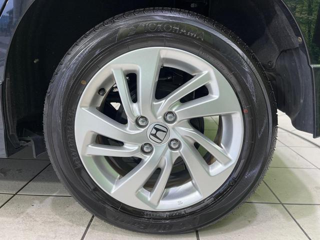 フィットハイブリッド Sパッケージ 4WD 純正ナビ バックカメラ シティブレーキサポート ETC Bluetooth フルセグ オートライト プッシュスタート 純正15インチAW クルーズコントロール 電子格納ミラー 横滑り防止装置(55枚目)