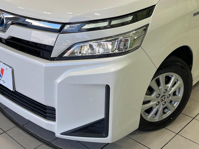 ヴォクシー ハイブリッドＸ　純正９型ナビ　後席モニター　両側パワースライドドア　バックカメラ　セーフティセンス　クルーズコントロール　ＥＴＣ　ドライブレコーダー　ＬＥＤランプ　オートライト　デュアルエアコン　スマートキー（13枚目）