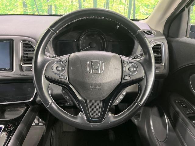 ヴェゼル ハイブリッドＺ・ホンダセンシング　純正８型ナビ　バックカメラ　ホンダセンシング　アダプティブクルコン　前席シートヒーター　ＥＴＣ　ルーフレール　パドルシフト　ＬＥＤランプ　ＬＥＤフォグ　デュアルエアコン　スマートキー　ハーフレザー（12枚目）