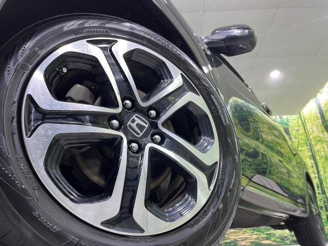 ヴェゼル ハイブリッドＺ・ホンダセンシング　純正８型ナビ　バックカメラ　ホンダセンシング　アダプティブクルコン　前席シートヒーター　ＥＴＣ　ルーフレール　パドルシフト　ＬＥＤランプ　ＬＥＤフォグ　デュアルエアコン　スマートキー　ハーフレザー（14枚目）