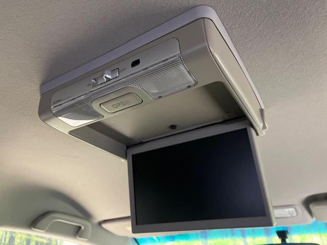 フリード Ｇ　プレミアムエディション　４ＷＤ　純正９型ナビ　後席モニター　両側パワースライドドア　バックカメラ　クルーズコントロール　ＥＴＣ　ＣＤ／ＤＶＤ／フルセグ　ＨＩＤランプ　フロントフォグ　オートライト　オートエアコン　スマートキー（3枚目）