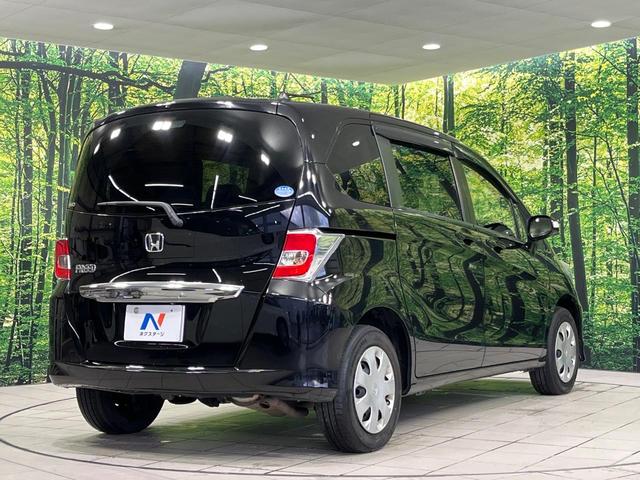 フリード Ｇ　プレミアムエディション　４ＷＤ　純正９型ナビ　後席モニター　両側パワースライドドア　バックカメラ　クルーズコントロール　ＥＴＣ　ＣＤ／ＤＶＤ／フルセグ　ＨＩＤランプ　フロントフォグ　オートライト　オートエアコン　スマートキー（18枚目）