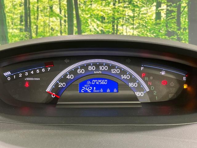 フリード Ｇ　プレミアムエディション　４ＷＤ　純正９型ナビ　後席モニター　両側パワースライドドア　バックカメラ　クルーズコントロール　ＥＴＣ　ＣＤ／ＤＶＤ／フルセグ　ＨＩＤランプ　フロントフォグ　オートライト　オートエアコン　スマートキー（28枚目）