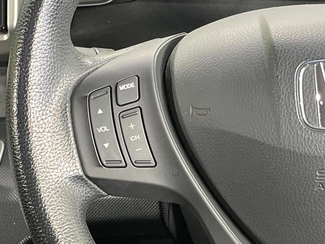 フリード Ｇ　プレミアムエディション　４ＷＤ　純正９型ナビ　後席モニター　両側パワースライドドア　バックカメラ　クルーズコントロール　ＥＴＣ　ＣＤ／ＤＶＤ／フルセグ　ＨＩＤランプ　フロントフォグ　オートライト　オートエアコン　スマートキー（29枚目）