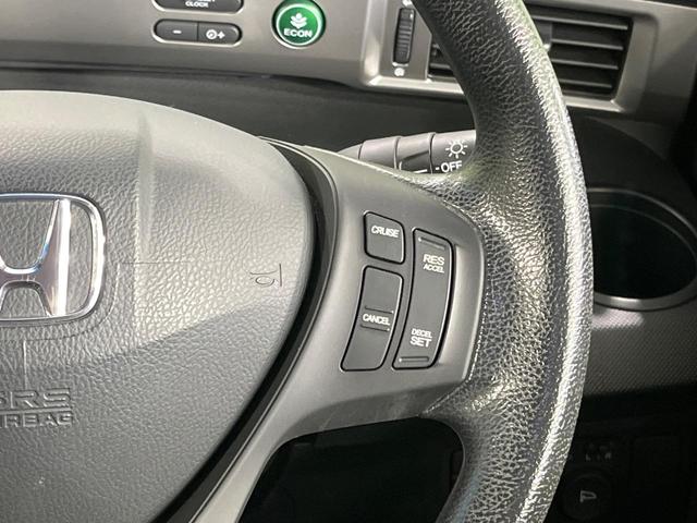 フリード Ｇ　プレミアムエディション　４ＷＤ　純正９型ナビ　後席モニター　両側パワースライドドア　バックカメラ　クルーズコントロール　ＥＴＣ　ＣＤ／ＤＶＤ／フルセグ　ＨＩＤランプ　フロントフォグ　オートライト　オートエアコン　スマートキー（30枚目）